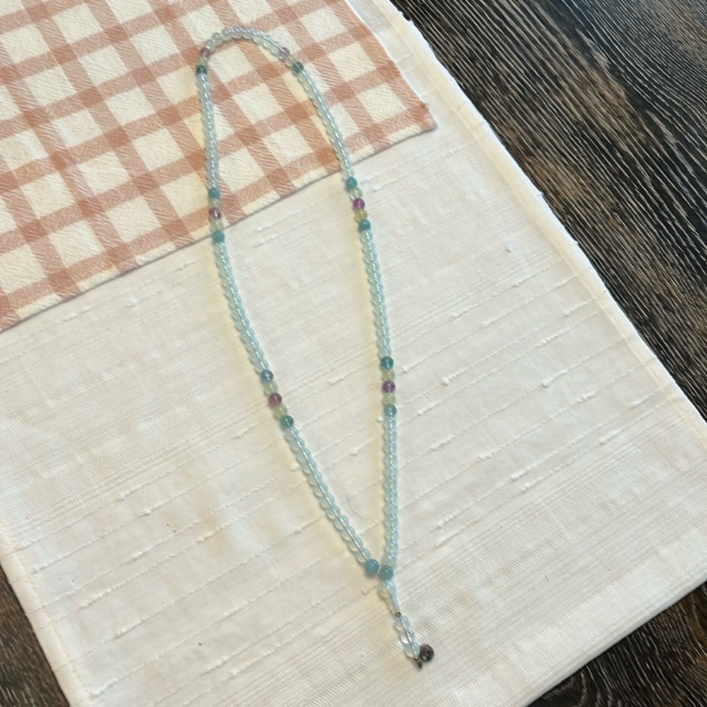 Mala necklace w blue and green agate, and moonstone. 18” long lying flat